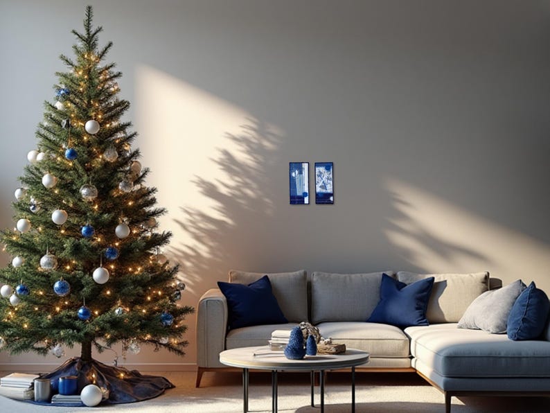 Elegant Christmas living room with indigo blue and white embroidered wall art by ElinaTextileArt, paired with blue ornaments and minimalist design.