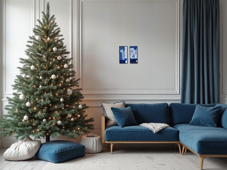 Minimalist living room interior with blue and white embroidered textile artworks by ElinaTextileArt, styled as modern Christmas wall decor.