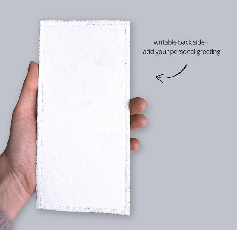 Writable backside of embroidered fiber artwork – add your personal message or dedication on fabric surface, handmade in Latvia.
