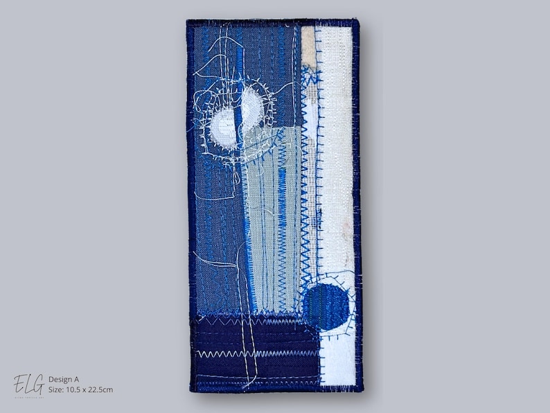 Indigo and white embroidered textile artwork – Design A by Elina Lusis-Grinberga, abstract geometric composition in layered linen and cotton textures.