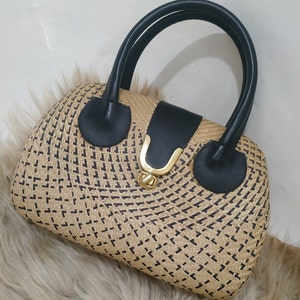 Mid century, 80&#39;s Hard Shell Woven Straw Clutch with Leather handles