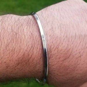 Cost of silver clearance kada for mens
