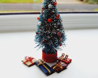 Dolls house miniature Christmas tree and presents.