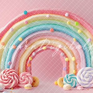 May include: A rainbow-colored candy archway with sprinkles and colorful lollipops and macarons in front of it. The background is a light pink.