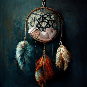 May include: A baby sleeping inside a dreamcatcher with colorful feathers. The dreamcatcher is made of brown leather and has a black web design. The feathers are blue, red, and white.