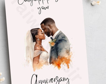 May include: A greeting card with the words "Congratulations on your Anniversary" in elegant script. The card features a watercolor illustration of a couple embracing, with warm orange and brown accents.