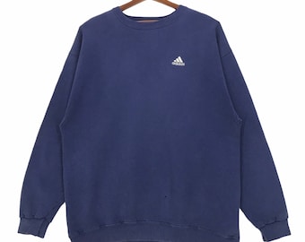 Sudadera vintage de la marca Adidas Sportswear, con logo pequeño. Talla grande.