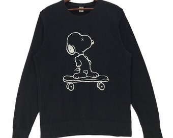 Sudadera Kaws X Peanuts con estampado de dibujos animados. Sudadera de Kaws, artista y diseñador estadounidense. Talla grande.