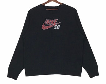 Bluza vintage Nike SB, sweter z okrągłym dekoltem (rozmiar średni)