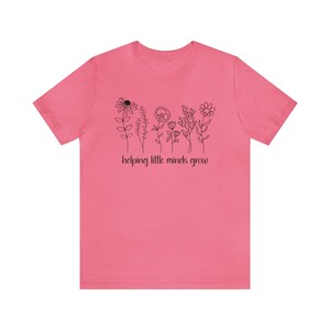 Helping Little Minds Grow - Flower teacher - Unisex Jersey Short Sleeve Tee
