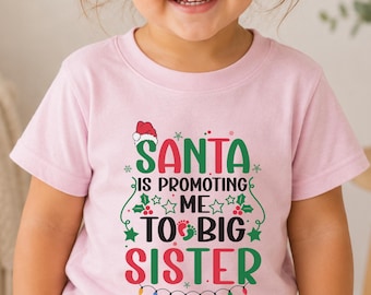 T-shirt de Noël pour enfants : « Le Père Noël me promeut grande sœur ! » – Annonce de naissance pour les filles