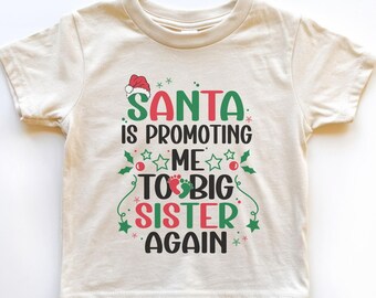 Le Père Noël me promeut à nouveau grande sœur ! T-shirt de Noël pour petite fille - Annonce de naissance - Promue à nouveau grande sœur - T-shirt de Noël pour enfants