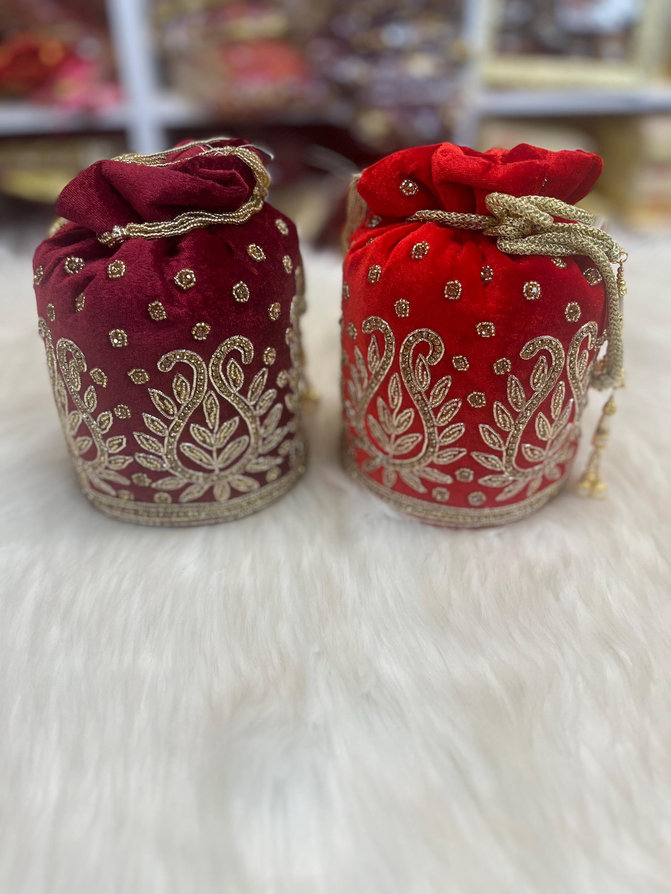 Designer Bridal Potli Bag for women with Embroidery and Embellished Stones
