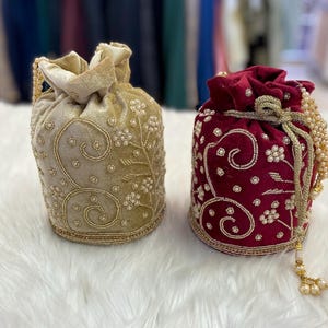 Designer Bridal Potli Bag for women with Embroidery and Embellished Stones