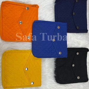May include: Four quilted fabric pouches with snap closures. The pouches are in orange, yellow, blue, and black.