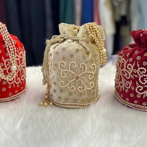 Designer Bridal Potli Bag for women with Embroidery and Embellished Stones