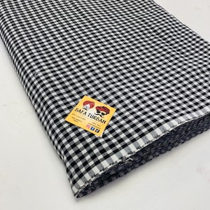 Ungenähter schwarz-weißer Karo-Turban (Karo-Parna)
