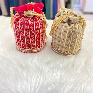 Designer Bridal Potli Bag for women with Embroidery and Embellished Stones