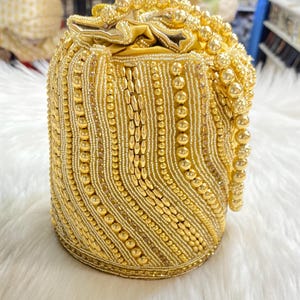 Designer Bridal Potli Bag for women with Embroidery and Embellished Stones- Gold