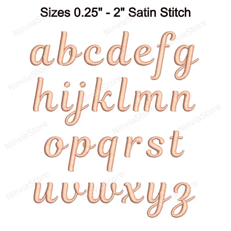 May include: A set of uppercase letters in a cursive font, embroidered in a light brown satin stitch. The letters are arranged in three rows, with the first row being a, b, c, d, e, f, and g. The second row is h, i, j, k, l, m, and n. The third row is o, p, q, r, s, t, u, v, w, x, y, and z. The letters are all approximately the same size and are spaced evenly apart.