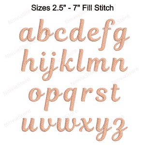 May include: A set of uppercase letters in a cursive font, embroidered in a light brown colour. The letters are arranged in three rows, with the first row being a, b, c, d, e, f, and g. The second row is h, i, j, k, l, m, and n. The third row is o, p, q, r, s, t, u, v, w, x, y, and z. The letters are designed for embroidery projects and are available in sizes from 2.5 inches to 7 inches.