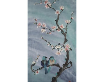 May include: Watercolor painting of a flowering tree branch with pink and white blossoms. Two blue birds perch on the branch. The background is a soft blue with a watercolor effect. A red square seal is in the lower right corner.