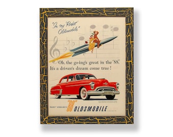 Framed original 1950 magazine ad for a 1950 Oldsmobile 88 car. Framed with a one of a kind hand painted picture frame.