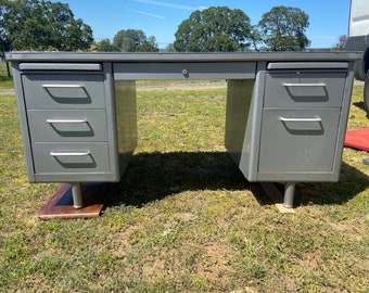 Steelcase vintage industrial metal tanker desk has patina