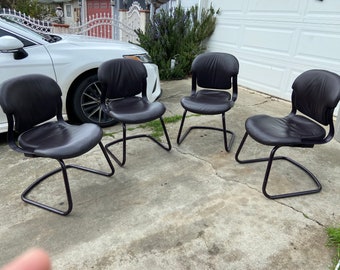 Vintage herman miller aqua leather side chairs
