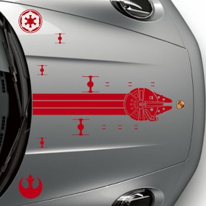May include: Red Star Wars-themed car decals. The decals include the Imperial symbol, Rebel Alliance symbol, and a Millennium Falcon design. The decals are applied to the silver body of a car.