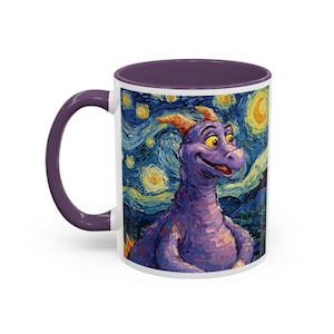 May include: White ceramic mug with a purple interior and handle. The mug features a whimsical purple dragon character set against a starry night sky background, reminiscent of a famous painting.