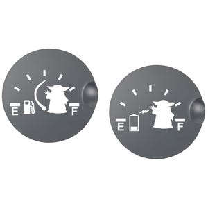 May include: Two gray, circular gauge stickers. One shows a fuel gauge with a white silhouette of a character. The other shows a battery gauge with the same character. Both gauges have white markings and text.