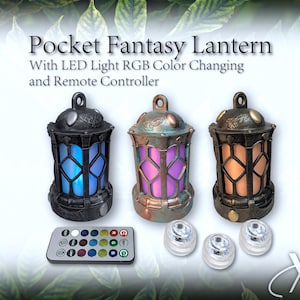 May include: Three Pocket Fantasy Lanterns with LED light RGB color changing and remote controller. The lanterns feature a cage-like frame with a top loop and are illuminated in blue, purple, and orange. Includes a remote and three LED pucks.