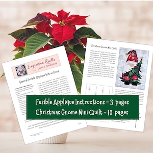 May include: A close-up of two printed pages with instructions for a Christmas Gnome Mini Quilt. The pages are on a white surface with a red poinsettia plant in the background. The text on the pages reads "Fusible Applique Instructions - 3 pages" and "Christmas Gnome Mini Quilt - 10 pages".