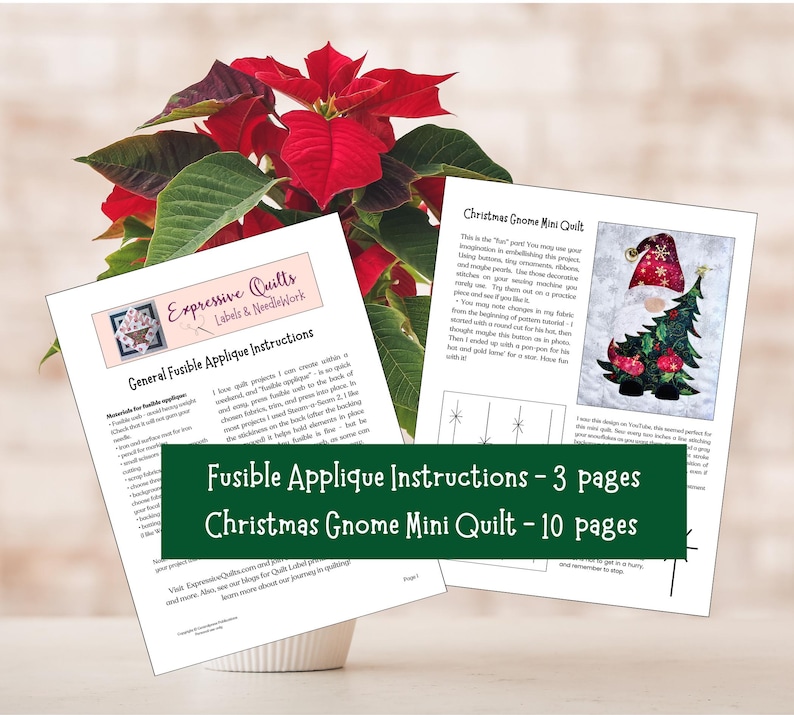 May include: A close-up of two printed pages with instructions for a Christmas Gnome Mini Quilt. The pages are on a white surface with a red poinsettia plant in the background. The text on the pages reads "Fusible Applique Instructions - 3 pages" and "Christmas Gnome Mini Quilt - 10 pages".