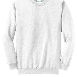 May include: White crew neck sweatshirt with long sleeves and a ribbed hem. The sweatshirt has a small tag on the front that says "Port & Company".