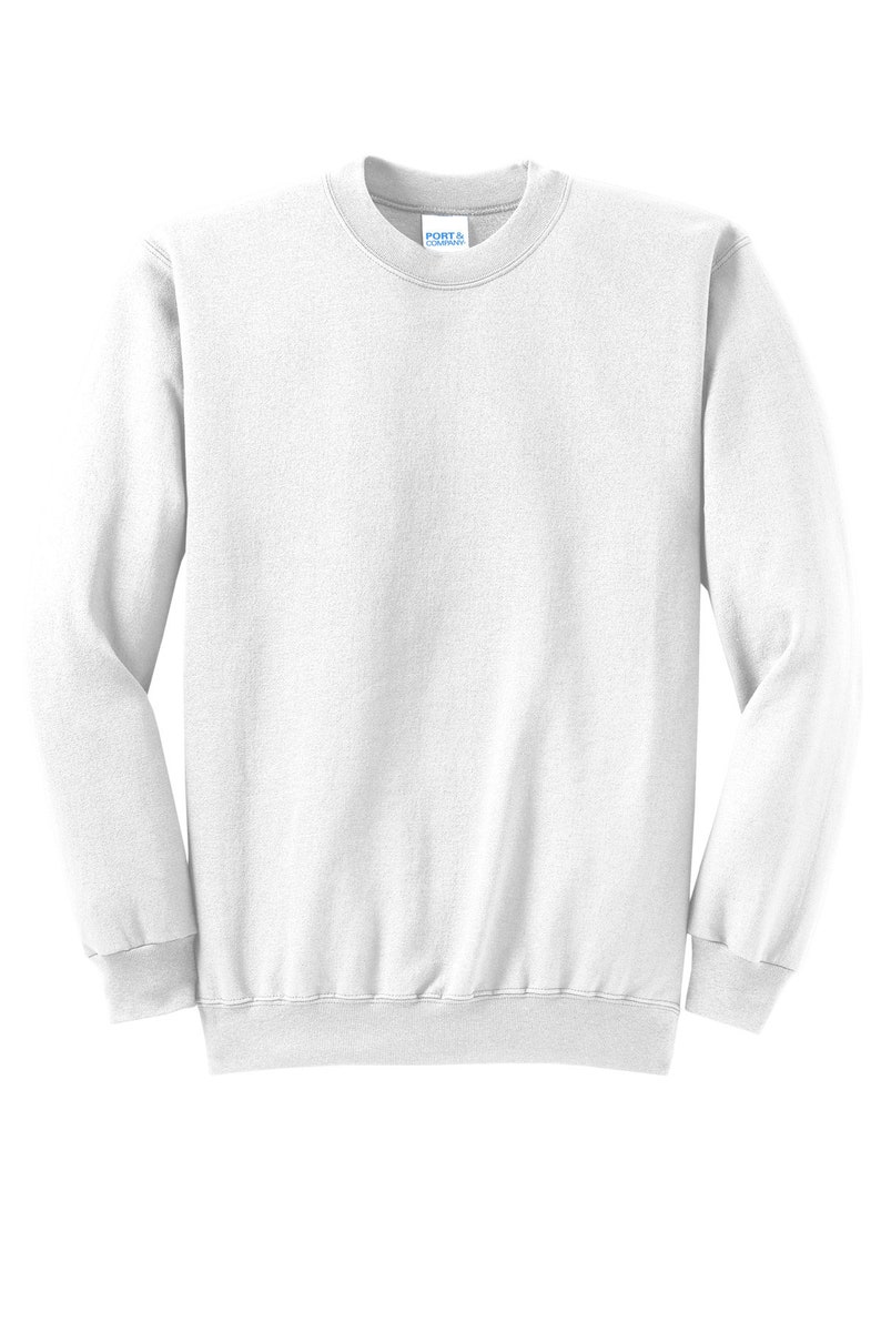 May include: White crew neck sweatshirt with long sleeves and a ribbed hem. The sweatshirt has a small tag on the front that says "Port & Company".