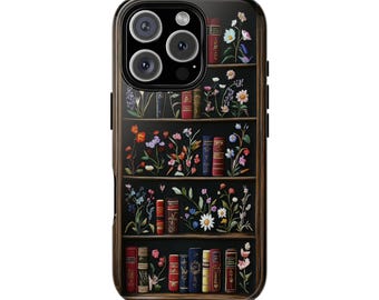May include: A black phone case with a bookshelf design featuring colourful flowers and books. The case has a cutout for the camera lens.