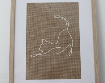Chat sur toile de jute
