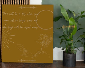 May include: A mustard yellow poster with a white outline of a sun, hands, and flowers. The poster has the text "There will be a day when your moon will no longer wane and your tears will be wiped away."