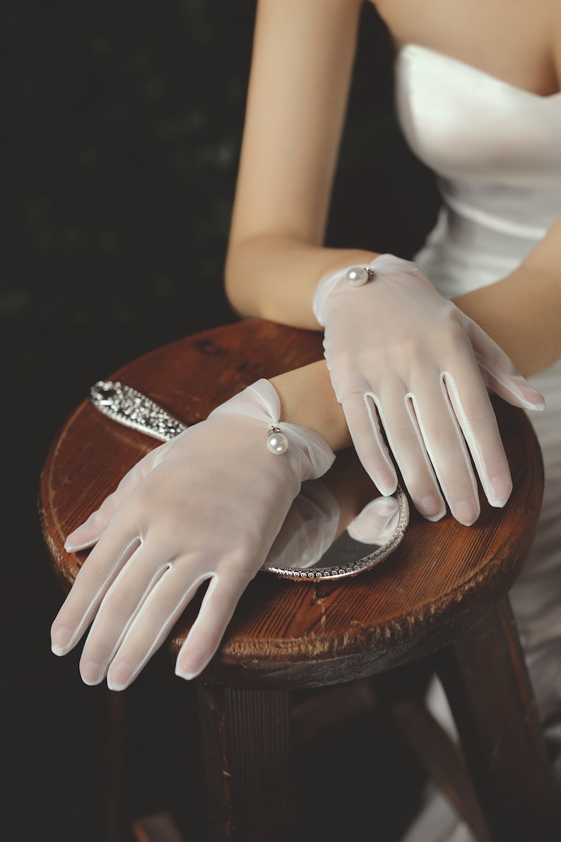 Delicate Beautiful White Sheer Gloves with Shiny Pearl. bridal gloves wedding accessory ideas. Delicate Beautiful White Sheer Gloves with Shiny Pearl image 1