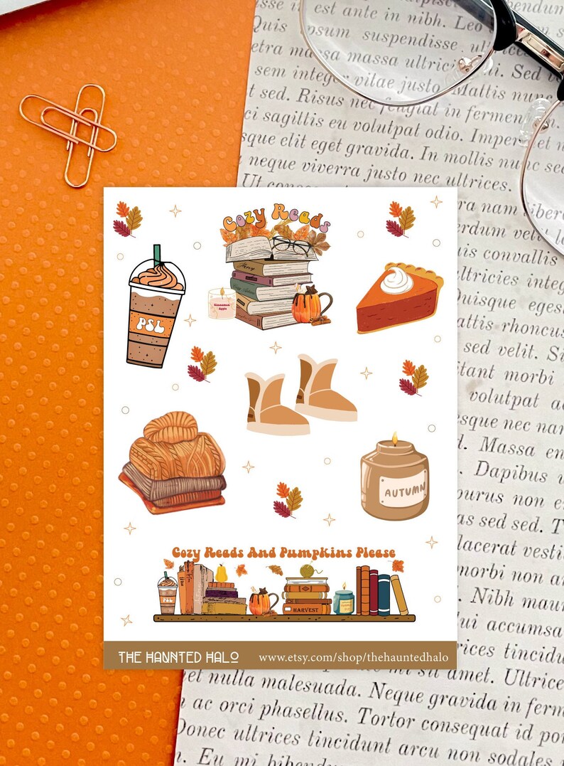 May include: A set of fall-themed stickers featuring a stack of books, a pumpkin spice latte, a slice of pumpkin pie, a pair of boots, a jar of candle, and a stack of books with pumpkins on a shelf. The text "Cozy Reads And Pumpkins Please" is included on the sticker.