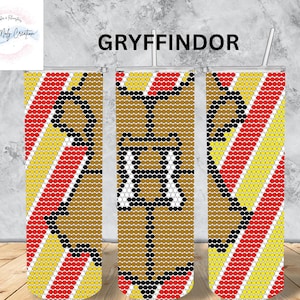 May include: Three stainless steel tumblers with a beaded design featuring the Gryffindor house crest from Harry Potter. The design includes red, yellow, black, and brown beads.