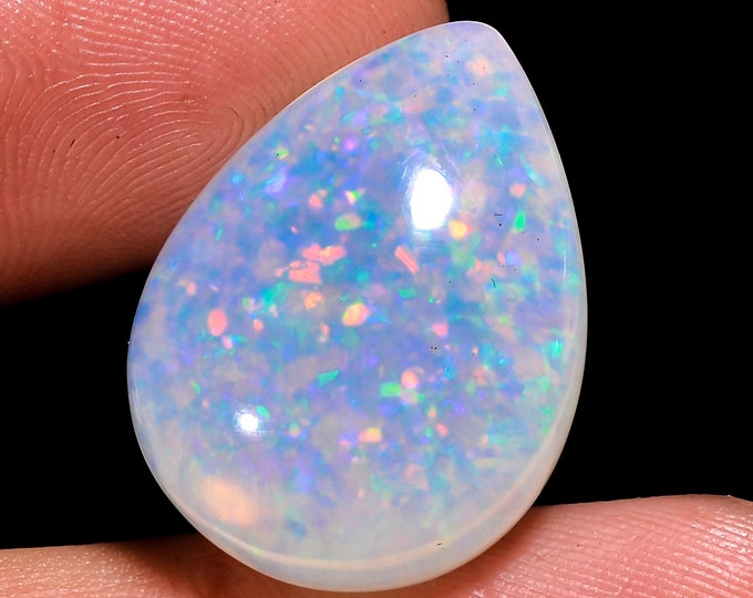 opal raw crystalOpal Cabochon: Stunning Loose Gemstone for Jewelry Making, 14.50 Crt,Natural white Rainbow fire Ethiopian opal cabochon.