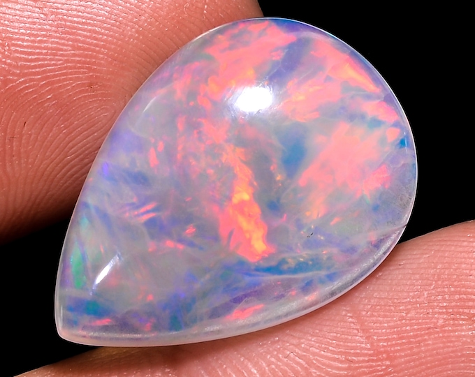 opal raw crystalOpal Cabochon: Stunning Loose Gemstone for Jewelry Making, 12.50 Crt,Natural white Rainbow fire Ethiopian opal cabochon.