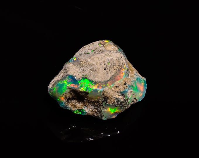 Natural Ethiopian Opal rough ,24X20X11 MM 16.55 Cts. KR14-24