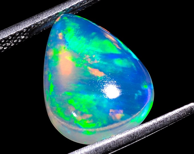 opal raw crystalOpal Cabochon: Stunning Loose Gemstone for Jewelry Making, 03.50 Crt,Natural white Rainbow fire Ethiopian opal cabochon.