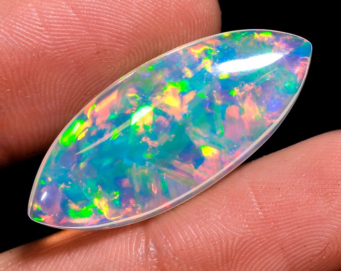 opal raw crystalOpal Cabochon: Stunning Loose Gemstone for Jewelry Making, 9.50 Crt,Natural white Rainbow fire Ethiopian opal cabochon.