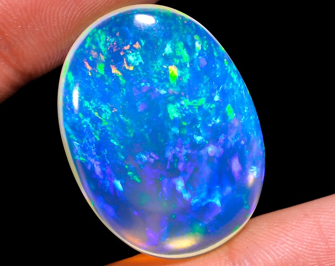opal raw crystalOpal Cabochon: Stunning Loose Gemstone for Jewelry Making, 29.50 Crt,Natural white Rainbow fire Ethiopian opal cabochon.