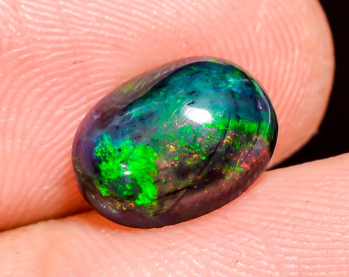 Natural Fire Black Ethiopian Opal Oval Gemstone 10x7x4 MM 1.05 Ct